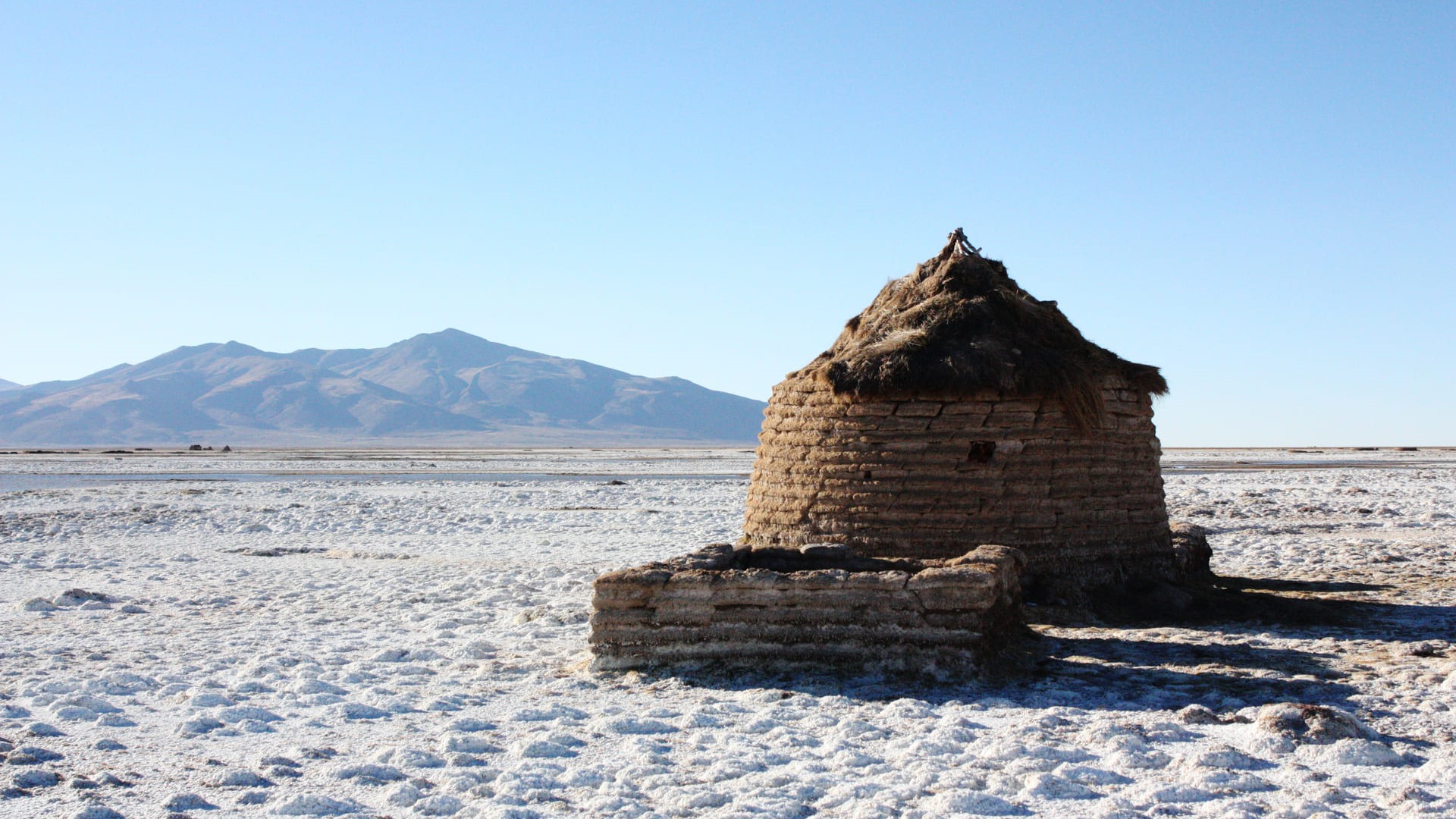 Conical house of moist clay 