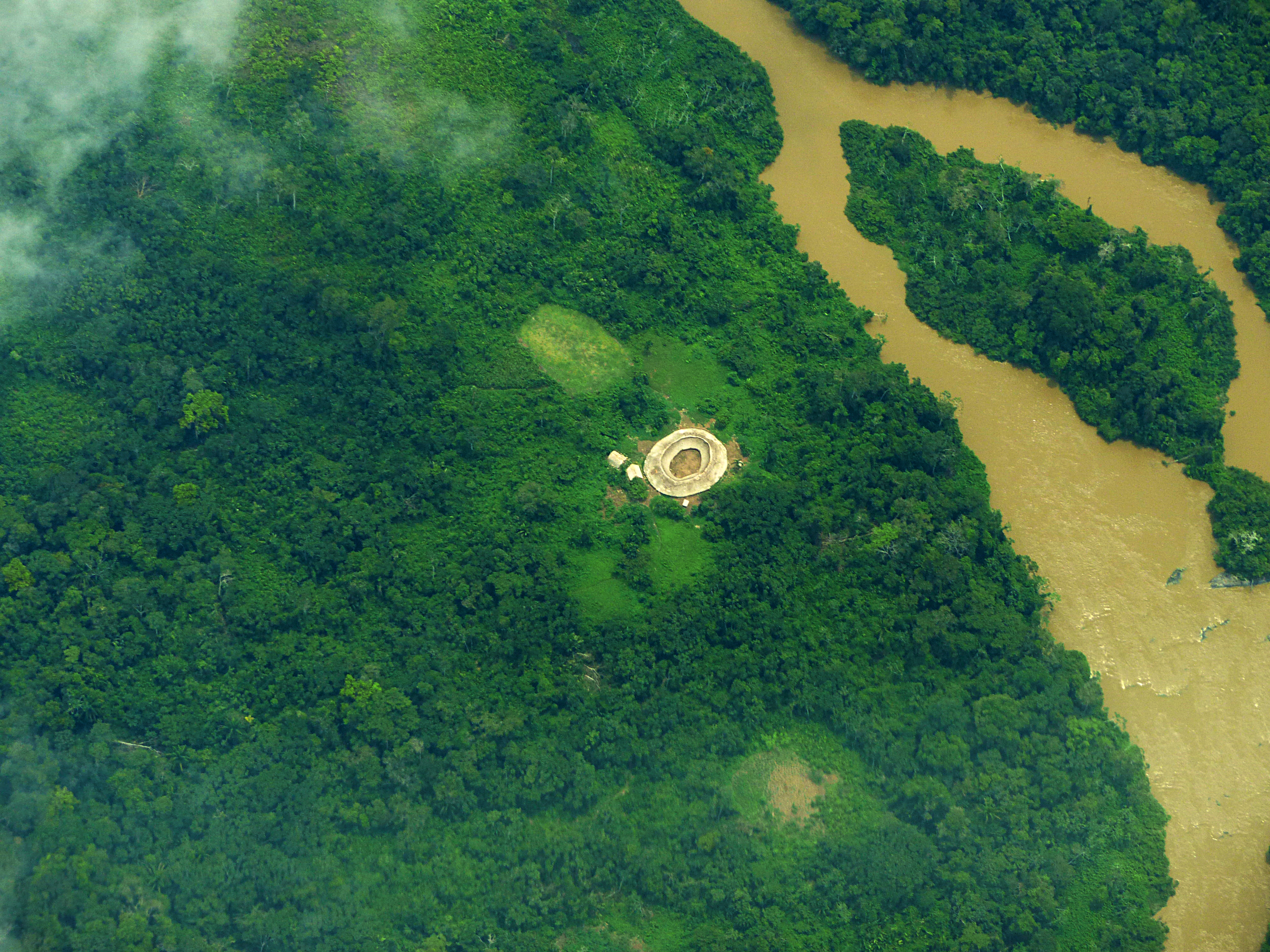 Distinctive circular Yanomami village seen from the air in the Catrimani Valley, northern Brazil