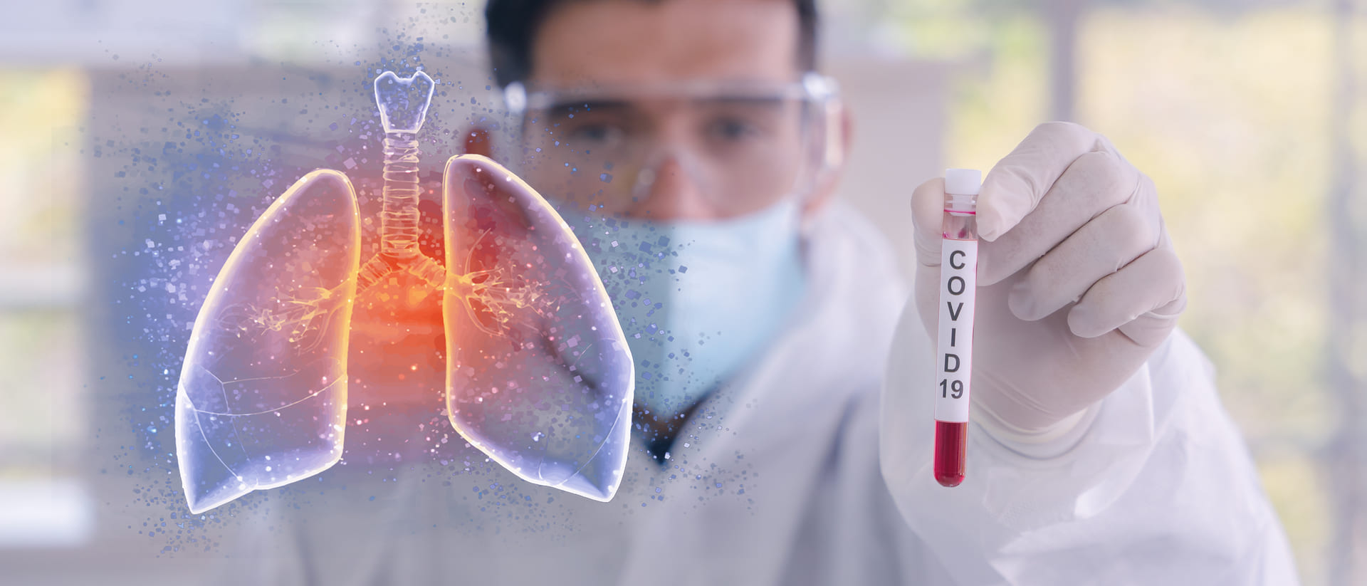 Doctor showing Covid-19 blood sample and infected lungs